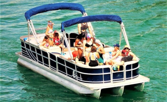 people in a pontoon