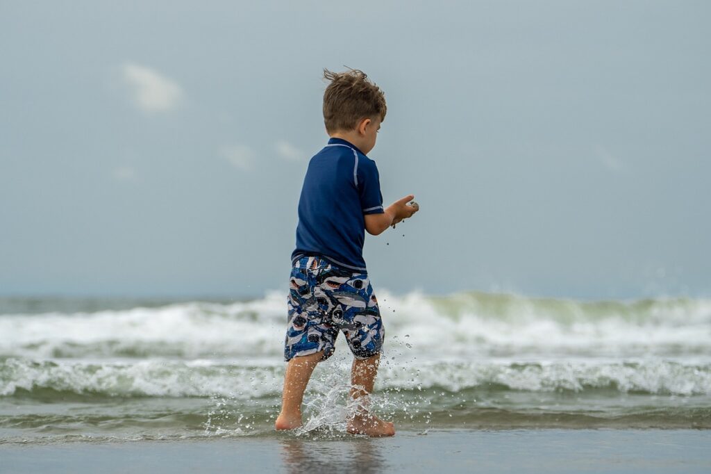 a child on the beach